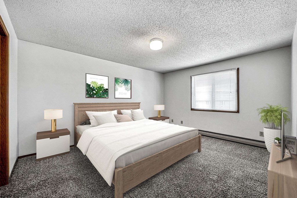 a bedroom with a bed and a window a bedroom with a bed and a window at Autumn Park, Sioux Falls, 57106
