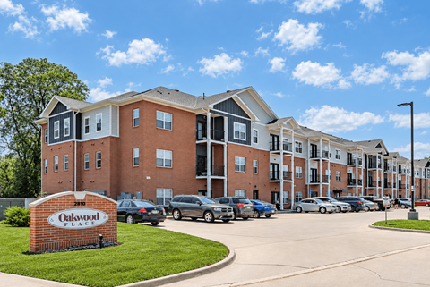 A large brick building with the name Oakwood on it.