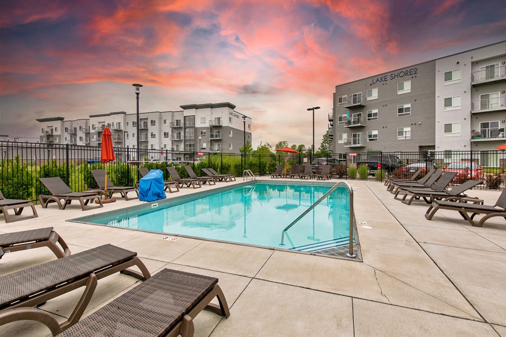 our apartments have a pool and lounge chairs at our apartments at Lake Shore Place Apartments, Iowa