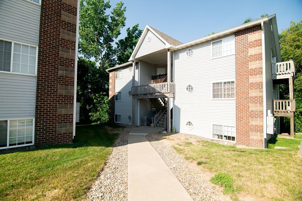 A two-story apartment building with a balcony on the second floor. at Saylorville Lakeside, Polk City, Iowa