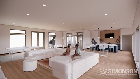 A modern living room with a white sofa and a television.