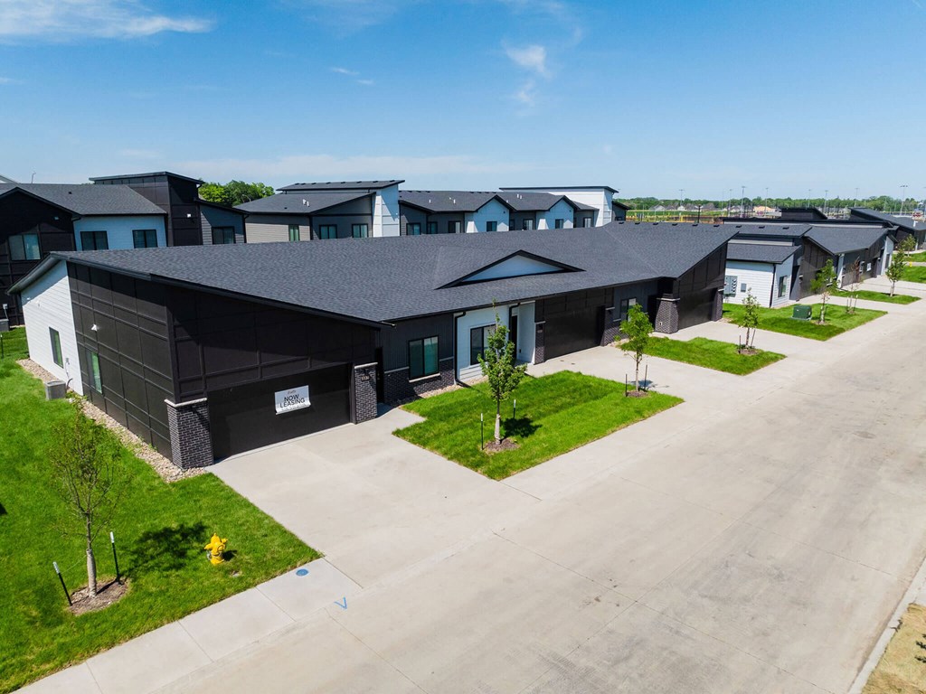 an aerial view of a group of houses in a neighborhood at Rialto Townhomes Apartments, Waukee, 50263