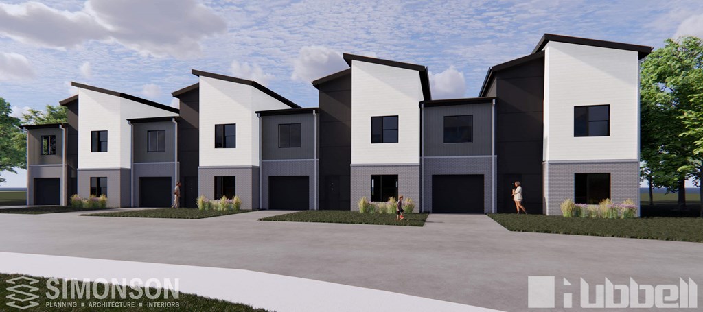 a group of white and black houses with black doors at Rialto Townhomes Apartments, Waukee, IA, 50263