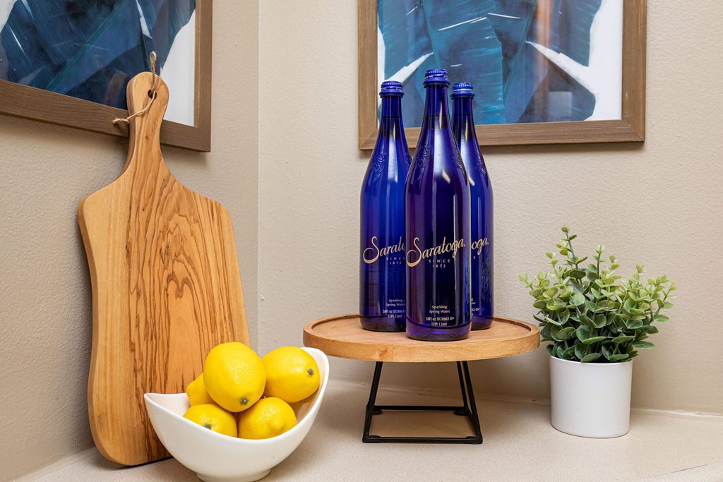 a window display of bottles of wine and a bowl of fruit at Lake Shore Park, Iowa 50021