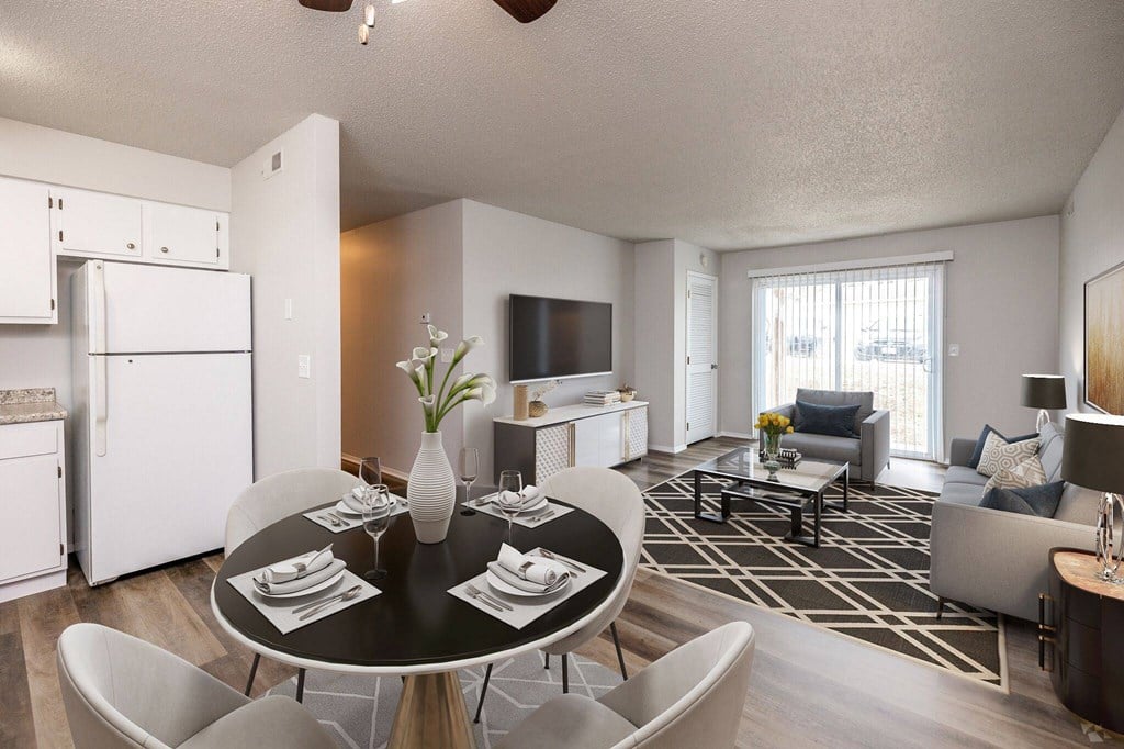 A modern dining room with a black table and chairs. A modern dining room with a black table and chairs.at Fish Creek, Norwalk, IA 50211