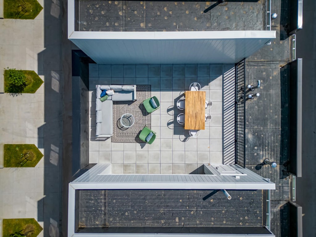 an overhead view of a bathroom with a sink and a shower at Matilda 235 Townhomes, Des Moines