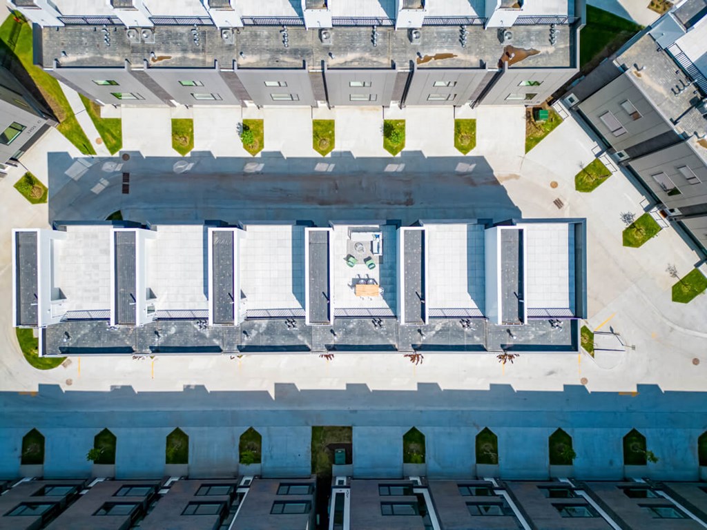 an aerial view of a parking lot on top of a building at Matilda 235 Townhomes, Des Moines, 50309