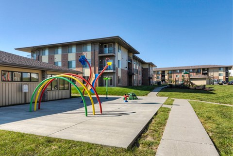 Playground For Children at Cedarbrooke Place , Norwalk, IA, 50211