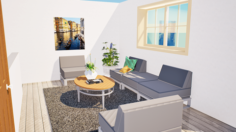 A living room with a grey couch, a coffee table, and a painting on the wall.