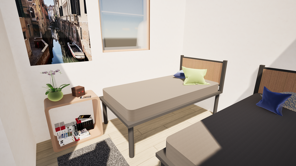 A bedroom with a bed, nightstand, and a picture of a canal in Venice.