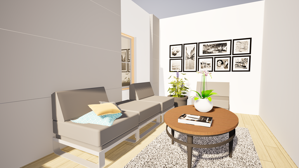 A living room with a sofa, a coffee table, and pictures on the wall.