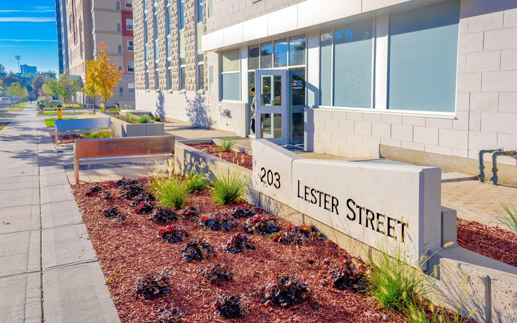 a street sign forlee street in front of a building