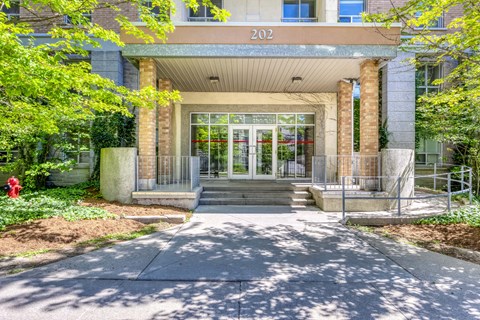 The front of a building with the number 202 on it.