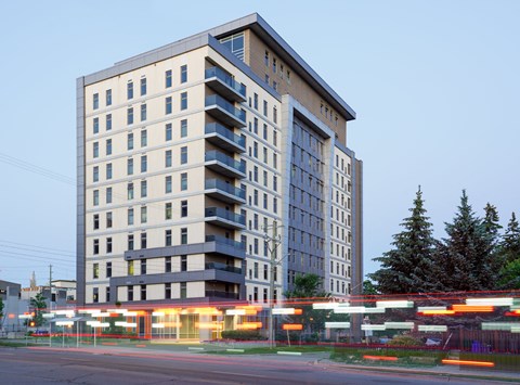 a tall building with a street in front of it