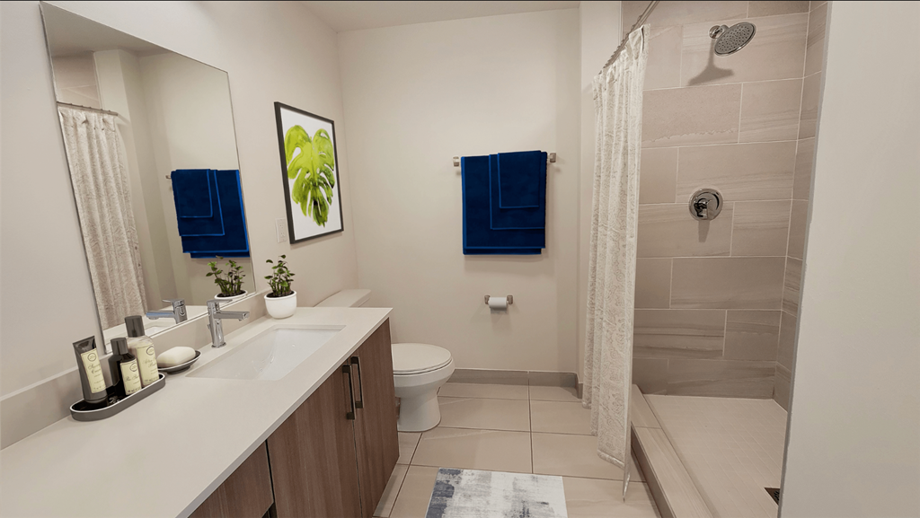 a bathroom with a shower and a sink and a toilet