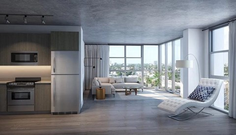 a living room with a couch and a chair