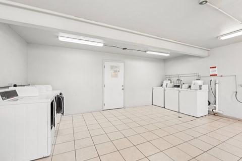 A laundry room with a washer and dryer.