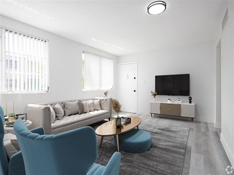 a living room with a couch and a television
