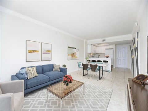 a living room with a couch and a table