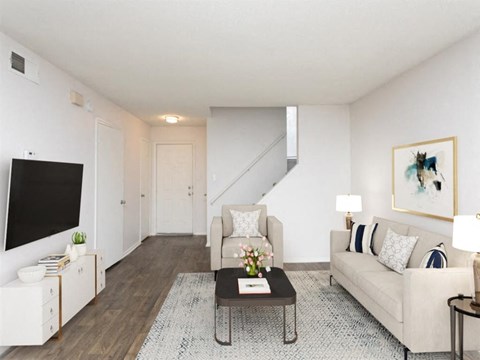 a living room with a couch and a coffee table