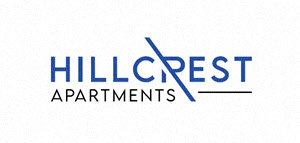 The image is a logo for Hillcrest Apartments.