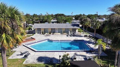 A house with a pool in the backyard.