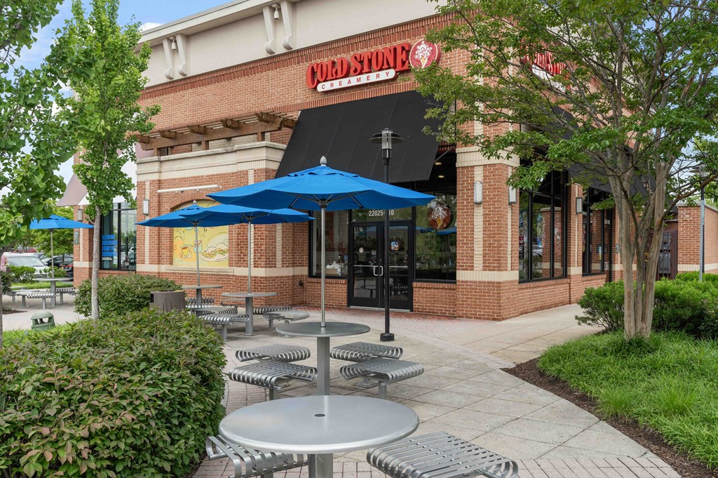 A restaurant named "Furby's" has tables and umbrellas outside.