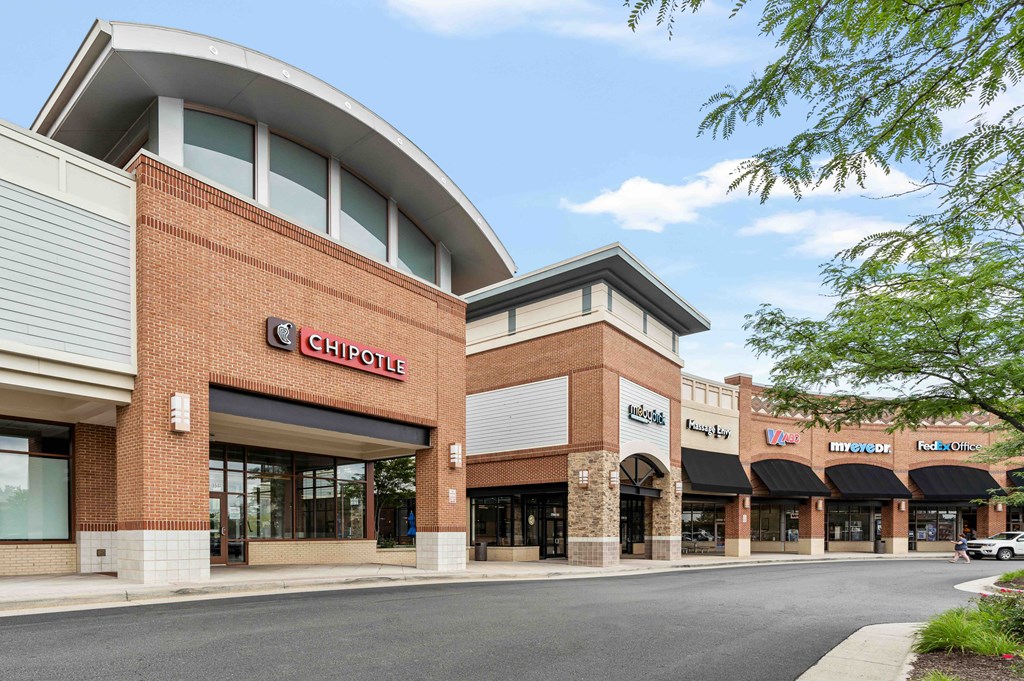 A Chipotle restaurant is located in a strip mall.