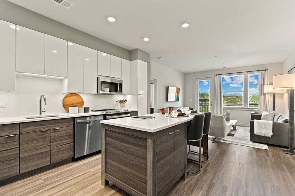 a kitchen with an island in the middle