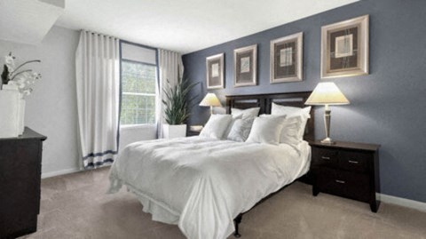 a bedroom with a bed and a carpet with colored dots