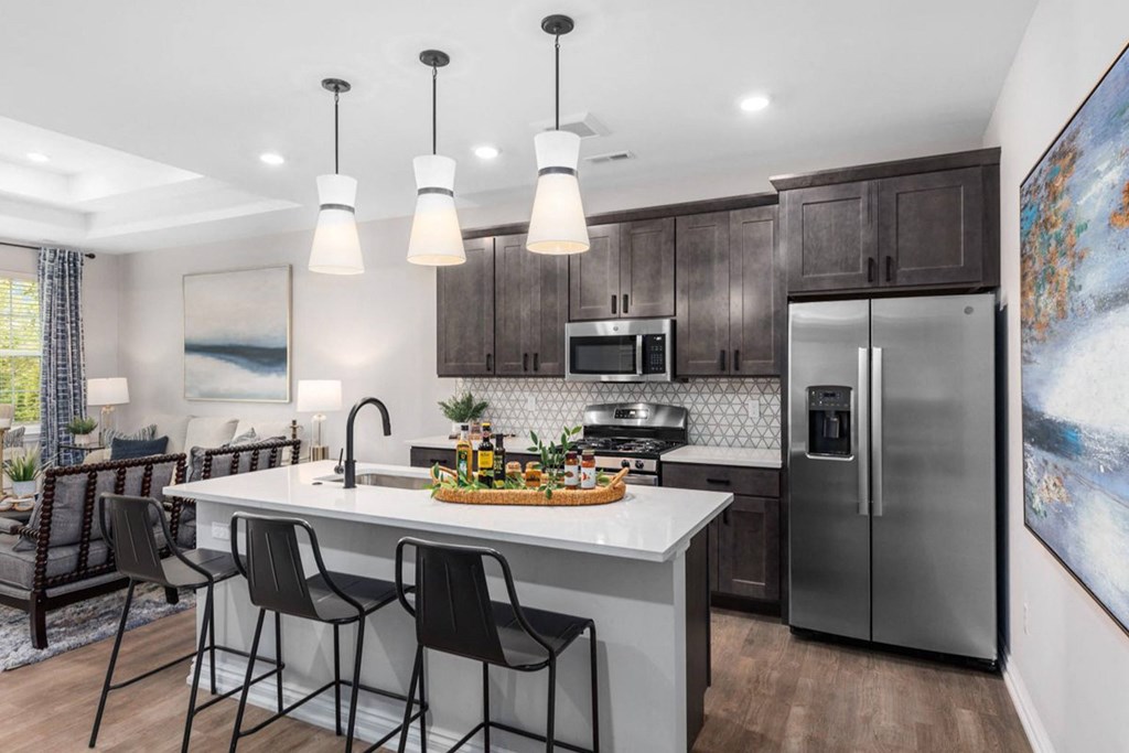 Fully Furnished Kitchen With Stainless Steel Appliances at Encore at West Valley, White Lake, MI