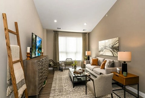 a living room with a couch and a table