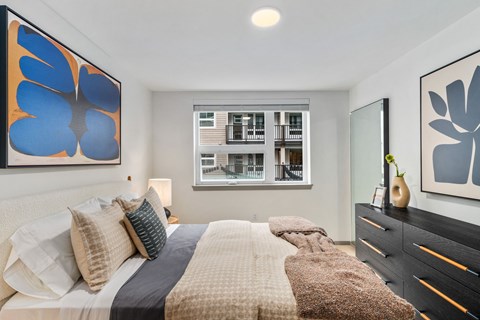 Bedroom with a Large Bed at Solera Apartments, Renton