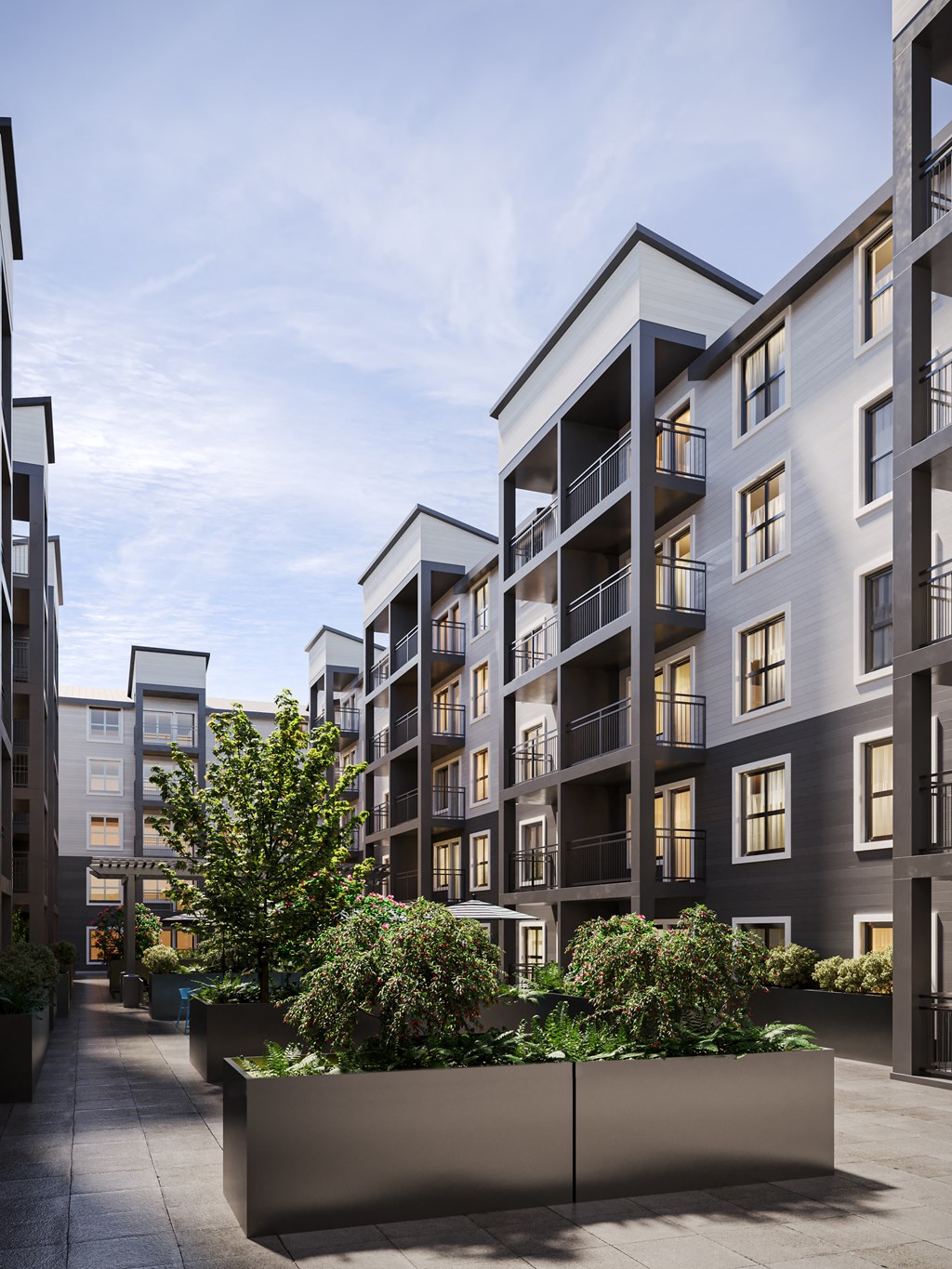 a rendering of an apartment building with a courtyard in front of it at Ovation at Meeker, Kent, WA 98032