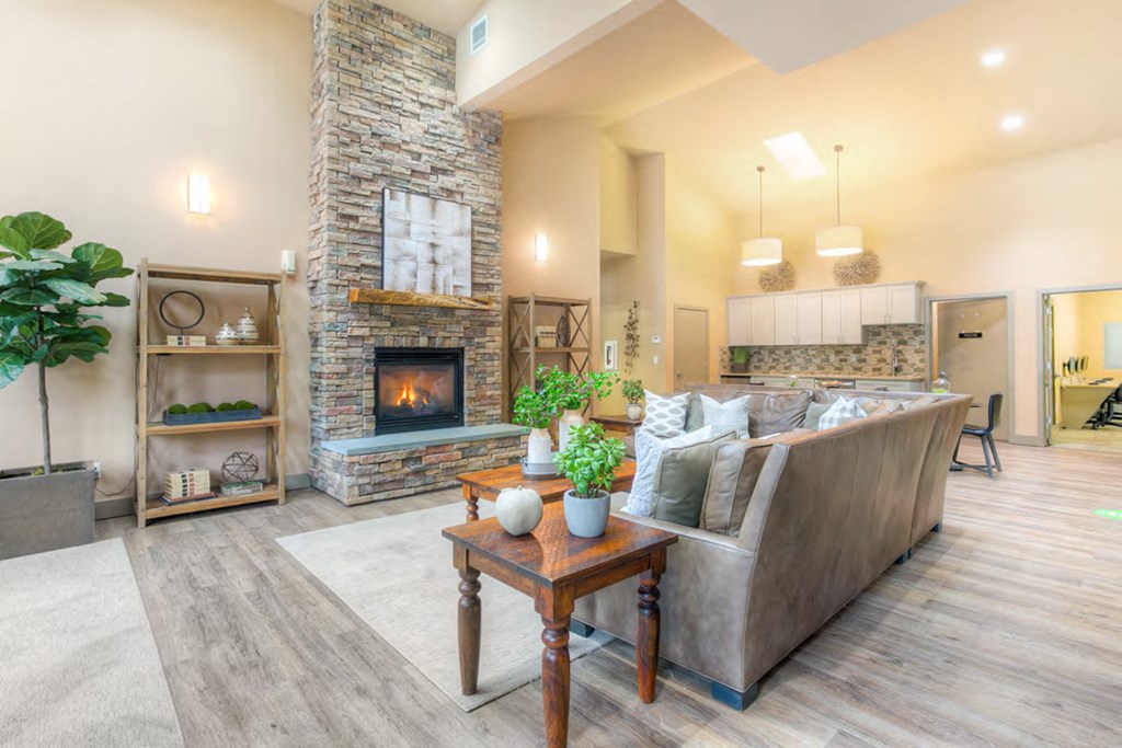 a living room with a fireplace and a couch