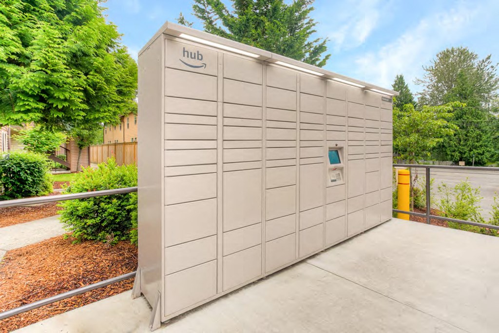 a small building with a garage door on the side of it