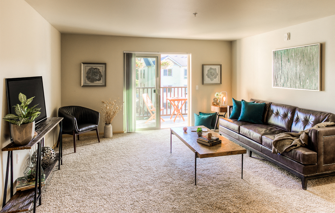 a living room with a couch and a coffee table