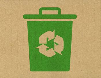 A green recycling bin symbol on a brown background.