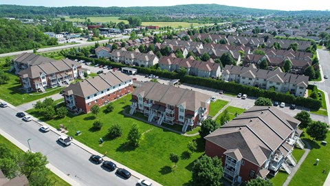 A large housing complex with a road running through it.
