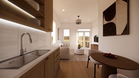 A modern kitchen with a wooden table and chairs.