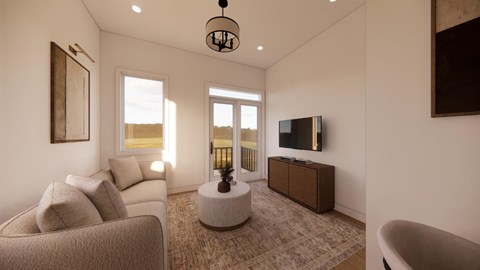 A living room with a couch, a chair, a television, and a window.