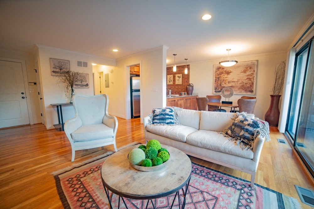 a living room with a couch and a table