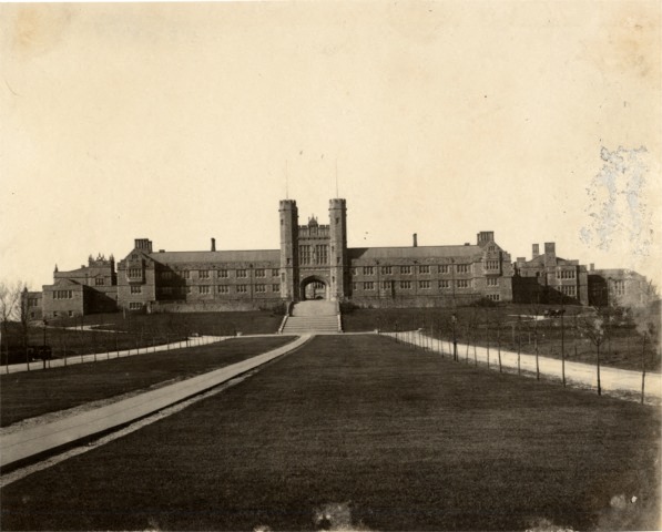 a black and white photo of a building on a campus