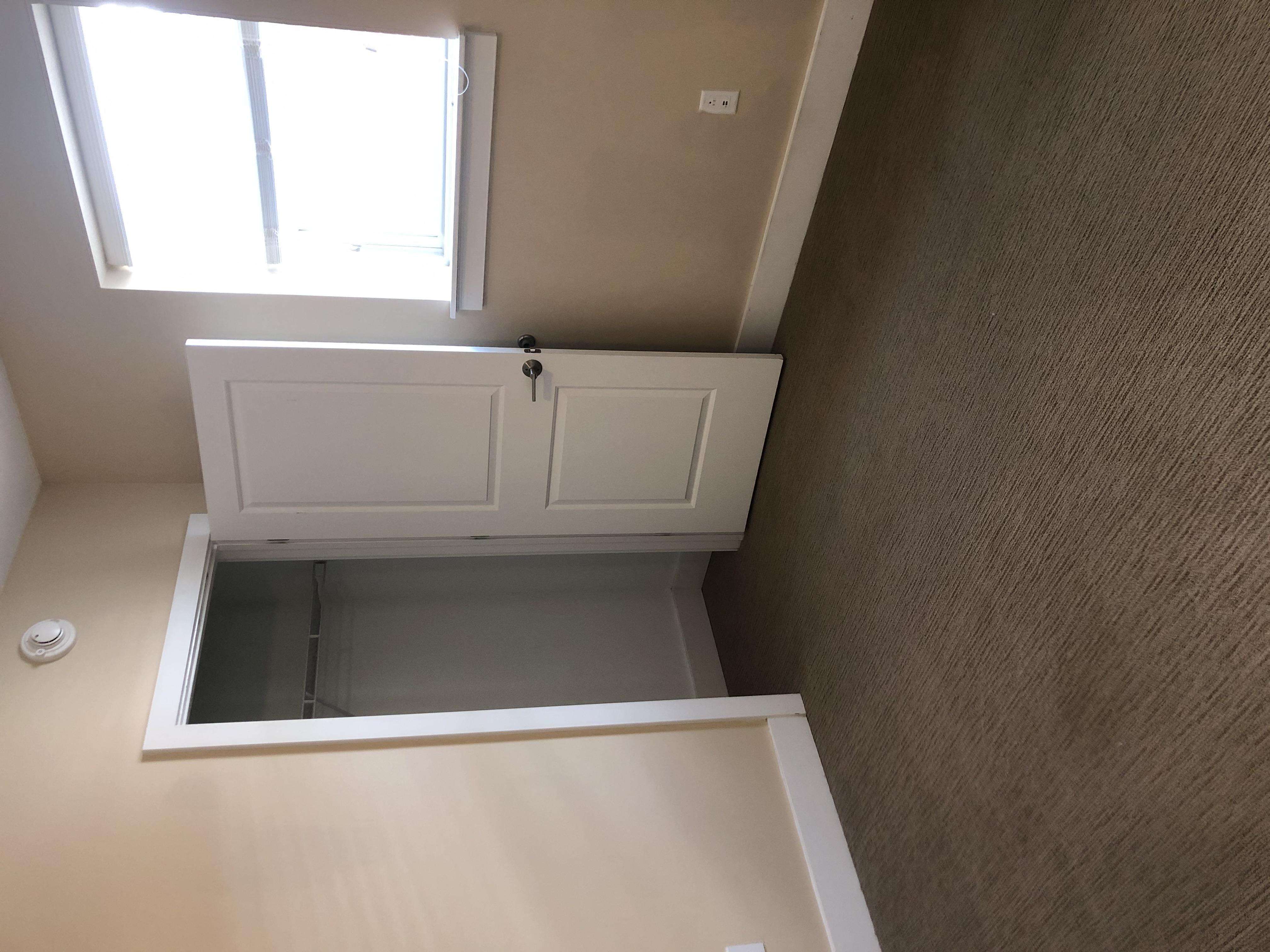 the bottom of the closet in the upstairs bathroom has a window