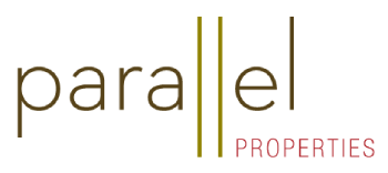 The image shows a logo with the word "parallel" in a stylized font, with the last letter "l" split into two vertical lines, and the word "PROPERTIES" in a smaller font below it.