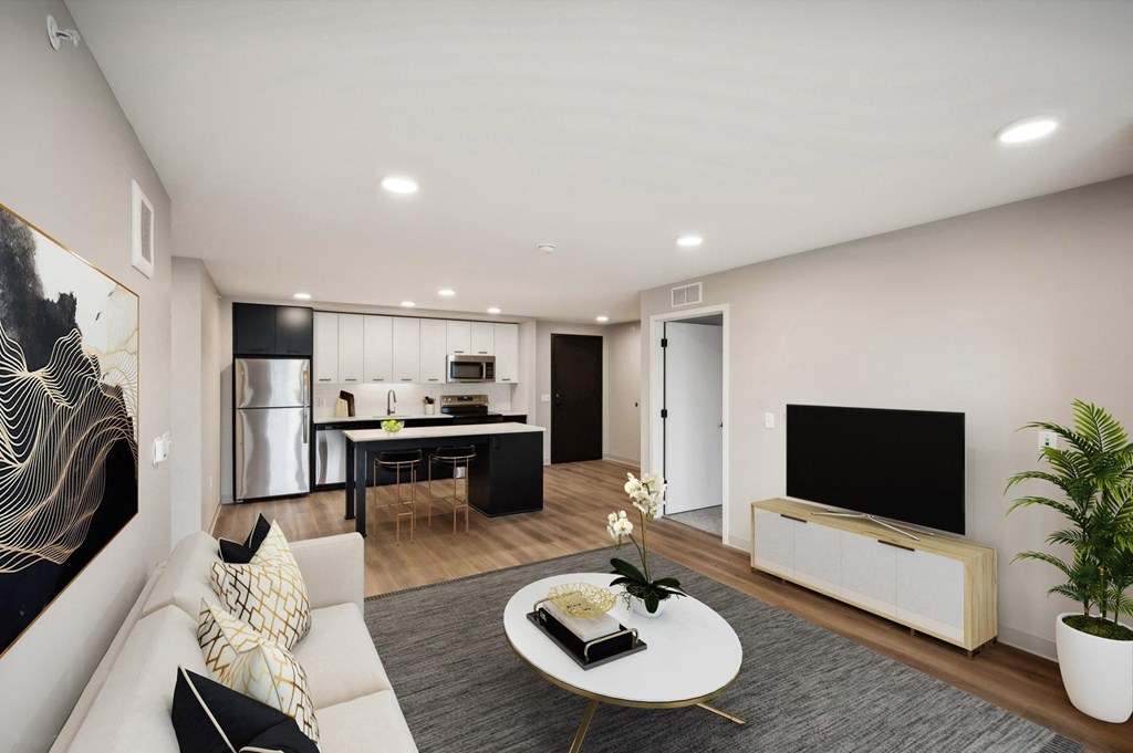 Harbourline Apartments, St Paul a living room with a couch and a table