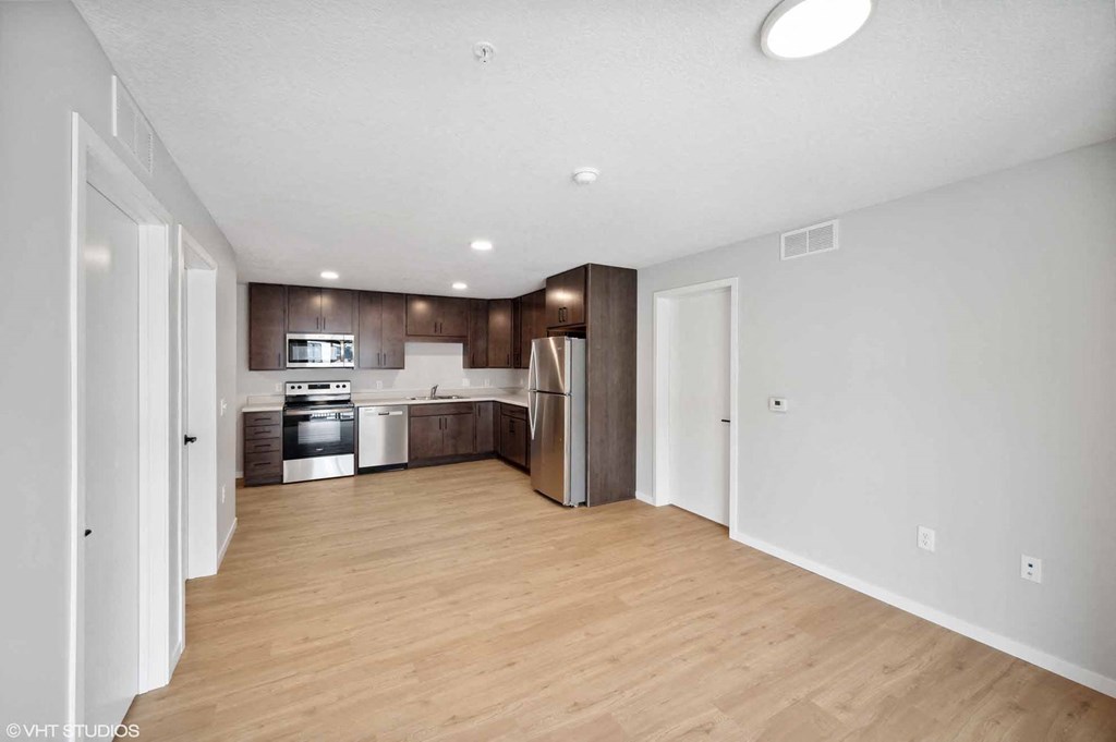 a The Flats at Malcolm Yards Kitchen and living room in a 555 waverly unit