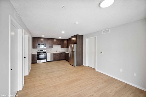 a The Flats at Malcolm Yards Kitchen and living room in a 555 waverly unit, Minneapolis, Minnesota