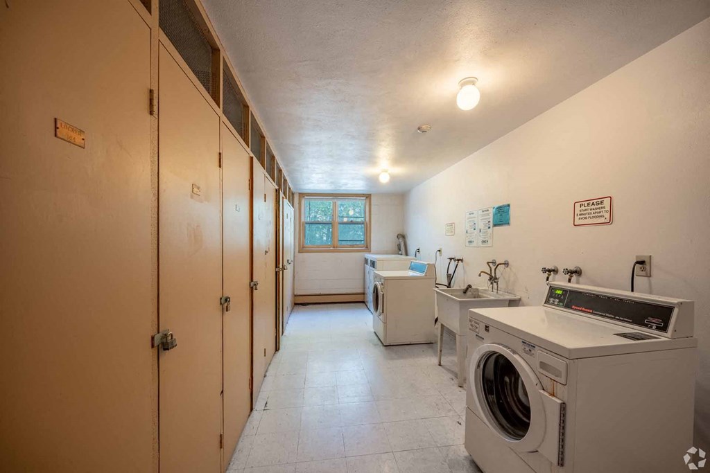 A laundry room with a washer and dryer.