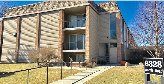 a building with a sign in front of it